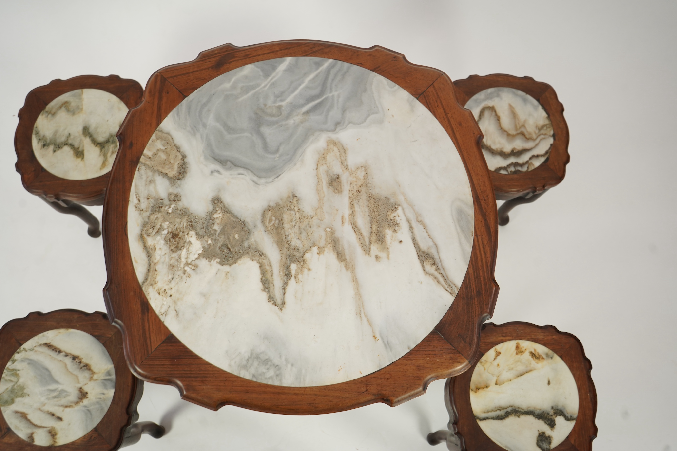 A Chinese dreamstone marble inset hongmu table and four matching stools